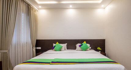 Treebo Sans Sarav Kushalnagar, 10 Mins To Nisargadhama Island Room Type - Deluxe Family Room