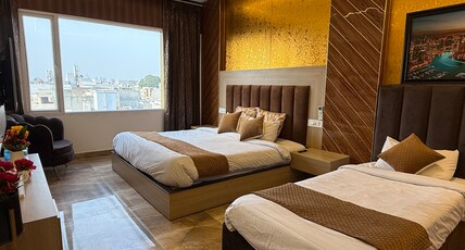 HolidayVilla Amritsar| Luxury Rooms & Suites Room Type - Superior Family Room with window for 3 , Common Modular Kitchen and Lobby HolidayVilla Amritsar| Luxury Rooms & Suites Room Type - Superior Family Room with window for 3 , Common Modular Kitchen and Lobby