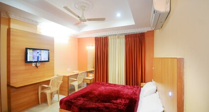 Megha Residency Room Type - Deluxe Double Room AC