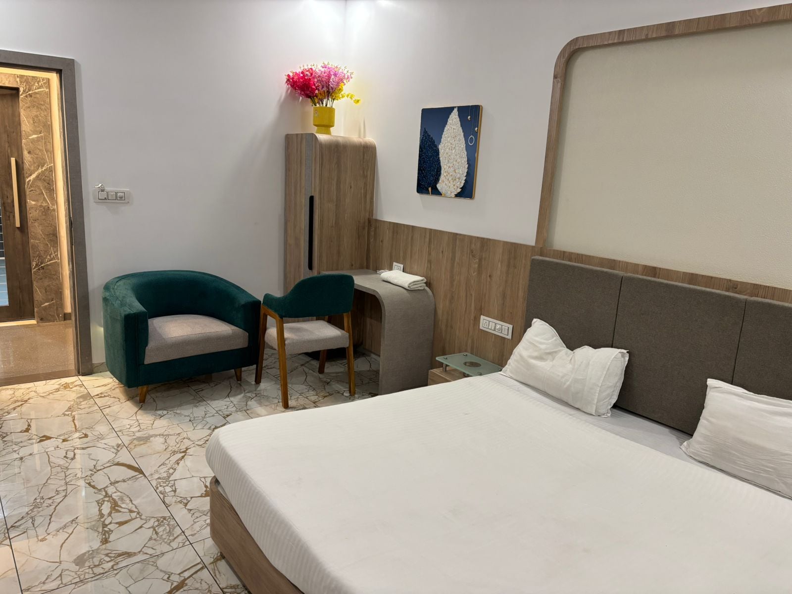Hotel Saffron, Chikhli - Tap to explore photos