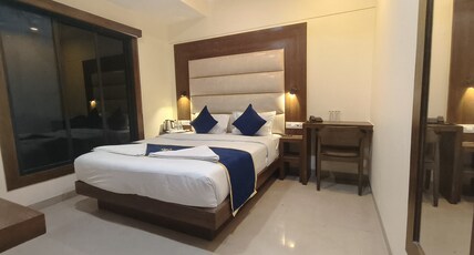 HOTEL ASHRAYA INTERNATIONAL Room Type - Deluxe Room