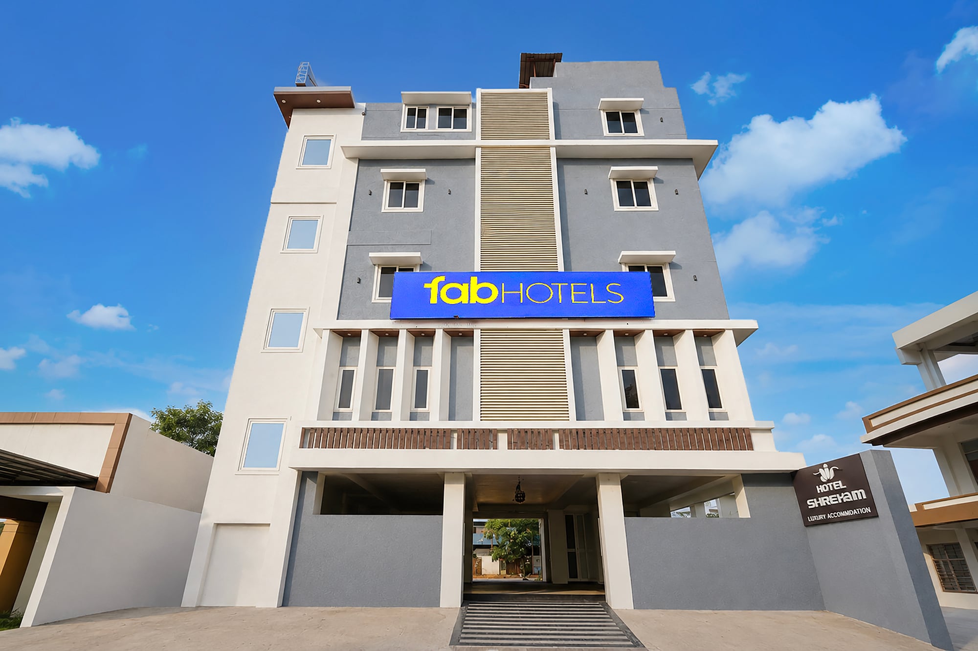 FabHotel Sushmitha Inn - Tap to explore photos