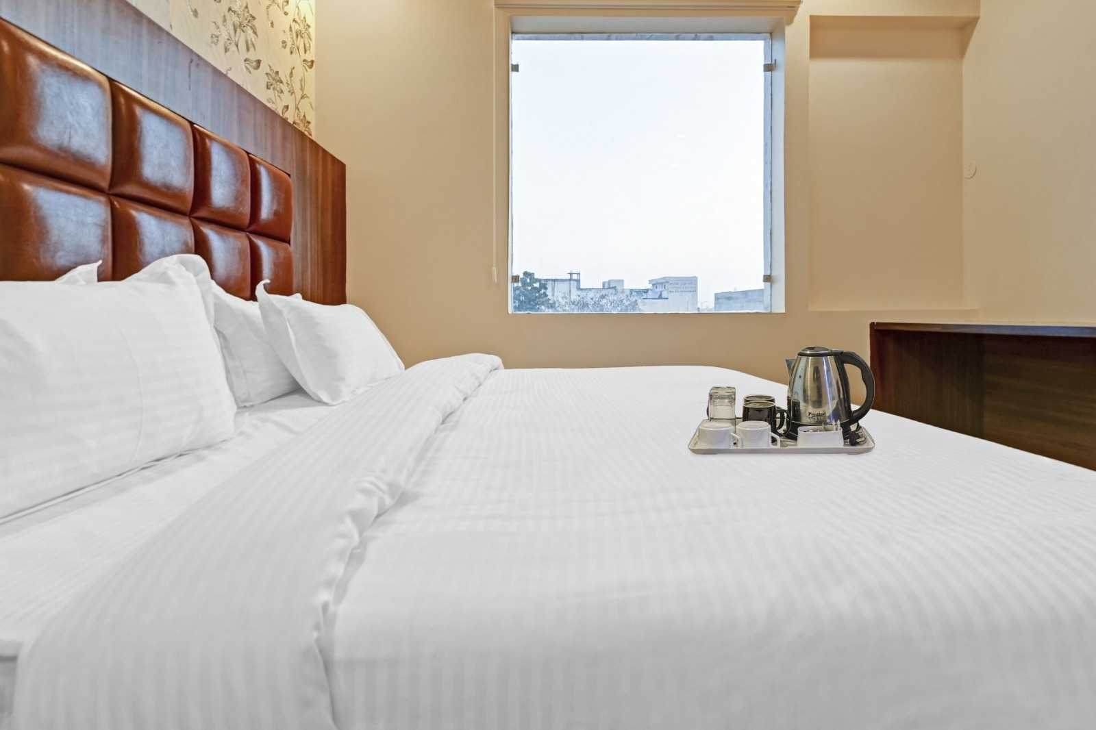 Super Hotel O Luxury Inn - Tap to explore photos
