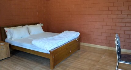Tranquil Farm stay Room Type - Deluxe Room Cottage