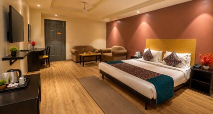 The Roseman Hotel & Suites Near Maxx Vaishali Room Type - Corporate Premium Suite with Balcony & Sofa