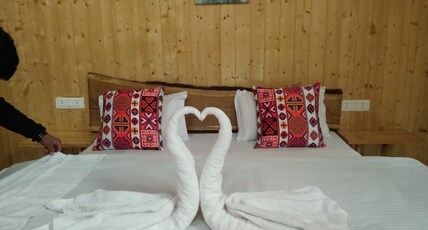 Offbeat Abodes - Tirthan Valley | Homestay Room Type - Stone Cottage Family Suite 2 Bedrooms 1 Living room Offbeat Abodes - Tirthan Valley | Homestay Room Type - Stone Cottage Family Suite 2 Bedrooms 1 Living room
