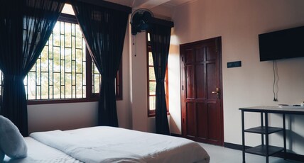 Royalty Global Homestay Room Type - Deluxe Room