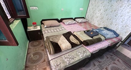 Chaukhamba Height Hotel Room Type - Budget Room for 3 to 4 Adults.