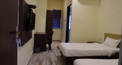 Hotel Radhe Inn Room Type - AC Delux Room