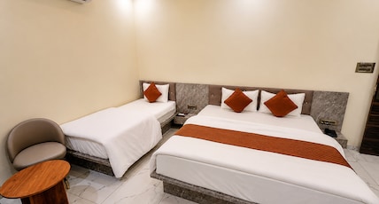Hotel Morvi Nandan Room Type - Deluxe Triple Room ( 1 Double Bed + 1 Single Bed | 3 Pax ) Hotel Morvi Nandan Room Type - Deluxe Triple Room ( 1 Double Bed + 1 Single Bed | 3 Pax )