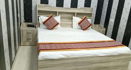 Mansa Hotel and Lawn Room Type - Deluxe Room