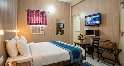 Hotel Govind Palace - Stay By The Ganga At Triveni Ghat Room Type - Deluxe Room With Smart TV (2 Adults + 1 Child) Hotel Govind Palace - Stay By The Ganga At Triveni Ghat Room Type - Deluxe Room With Smart TV (2 Adults + 1 Child)