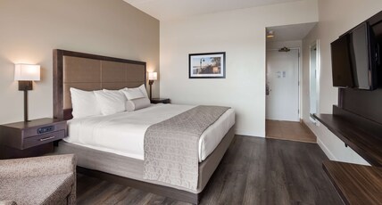 Best Western Plus Coastline Inn Room Type - Suite-1 King Bed, Non-Smoking, High Speed Internet Access, Sofabed, River View, Full Breakfast Best Western Plus Coastline Inn Room Type - Suite-1 King Bed, Non-Smoking, High Speed Internet Access, Sofabed, River View, Full Breakfast