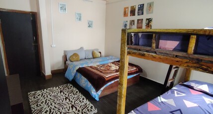 The Local Tribe - Cafe, Homestay & Hostel Room Type - Double Bedroom with Balcony