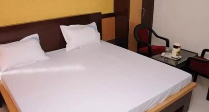 DWARAKA RESIDENCY Room Type - Deluxe Room