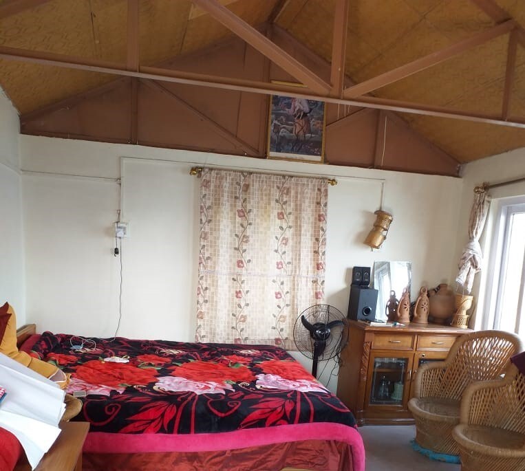 The Summer Rain Homestay | Rooms & Caretaker - Tap to explore photos