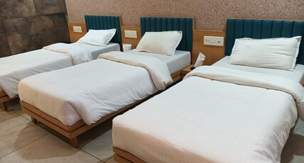 HOTEL LUXURA Room Type - DELUX  ROOM (THREE BED)
