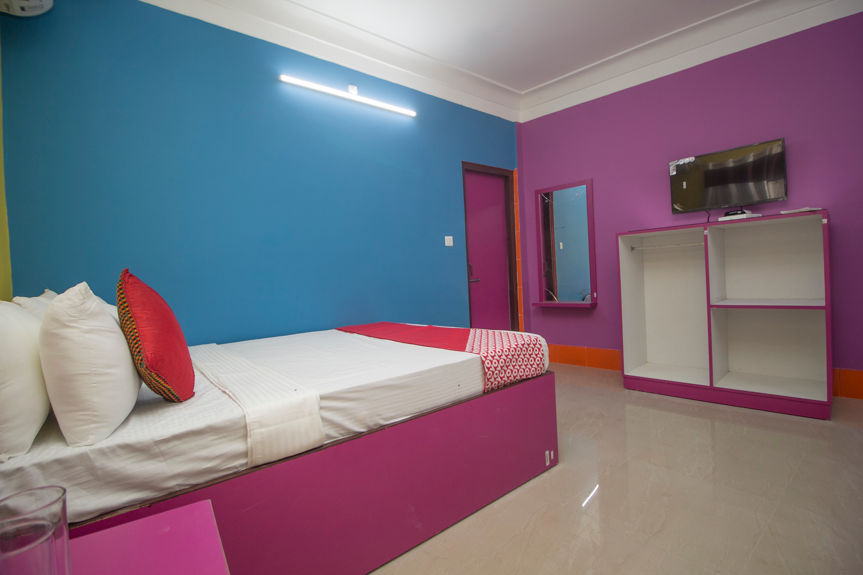 Collection O Relax Hotel - Tap to explore photos