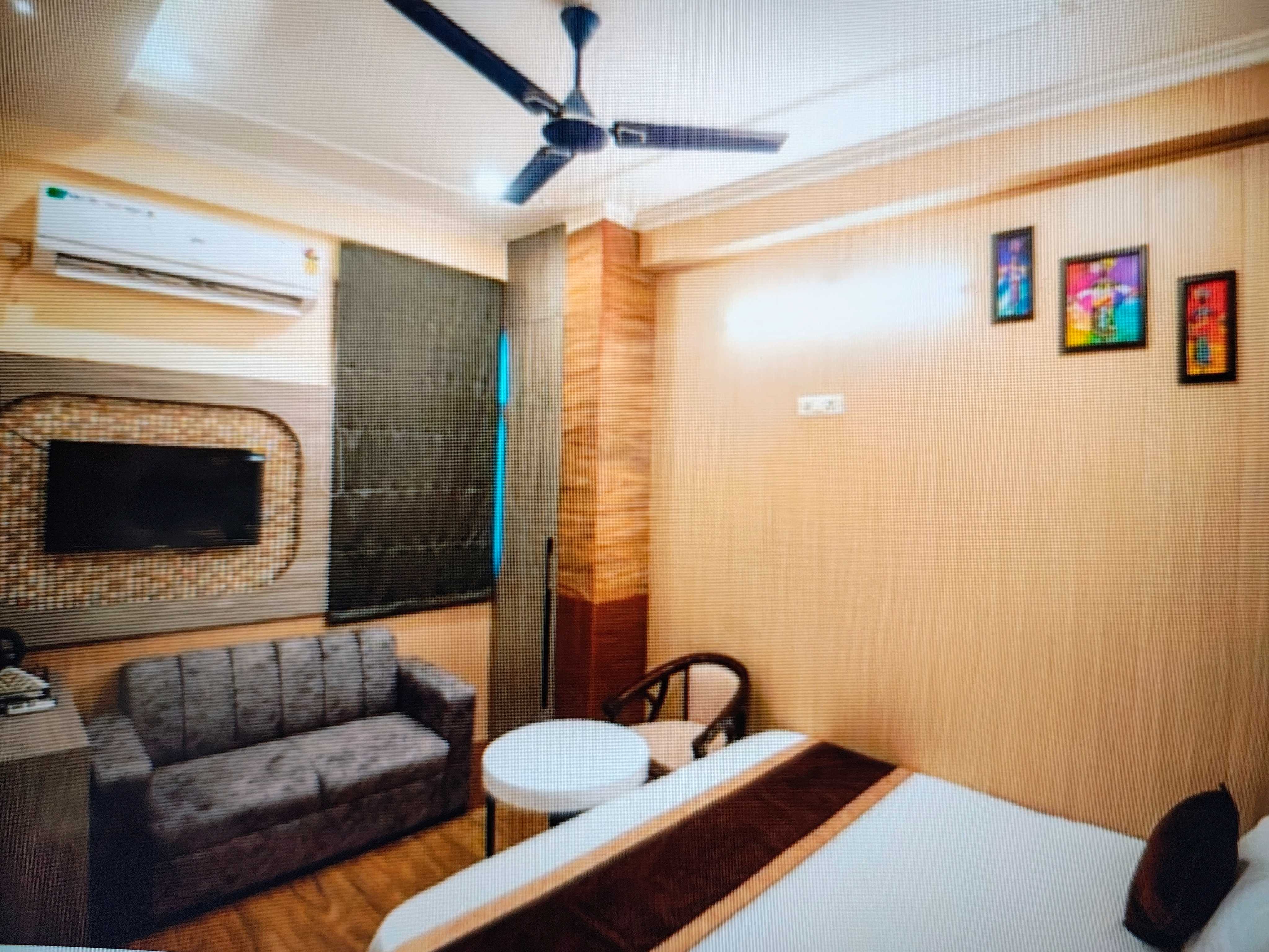 Hotel O Cozy Home stay Premium - Tap to explore photos