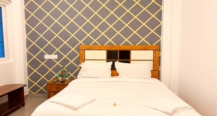 EESHA Beach View Stay ( Near Temple and Beach) Room Type - Deluxe Queen Bed ( without Lift 1st or 2nd Floor)