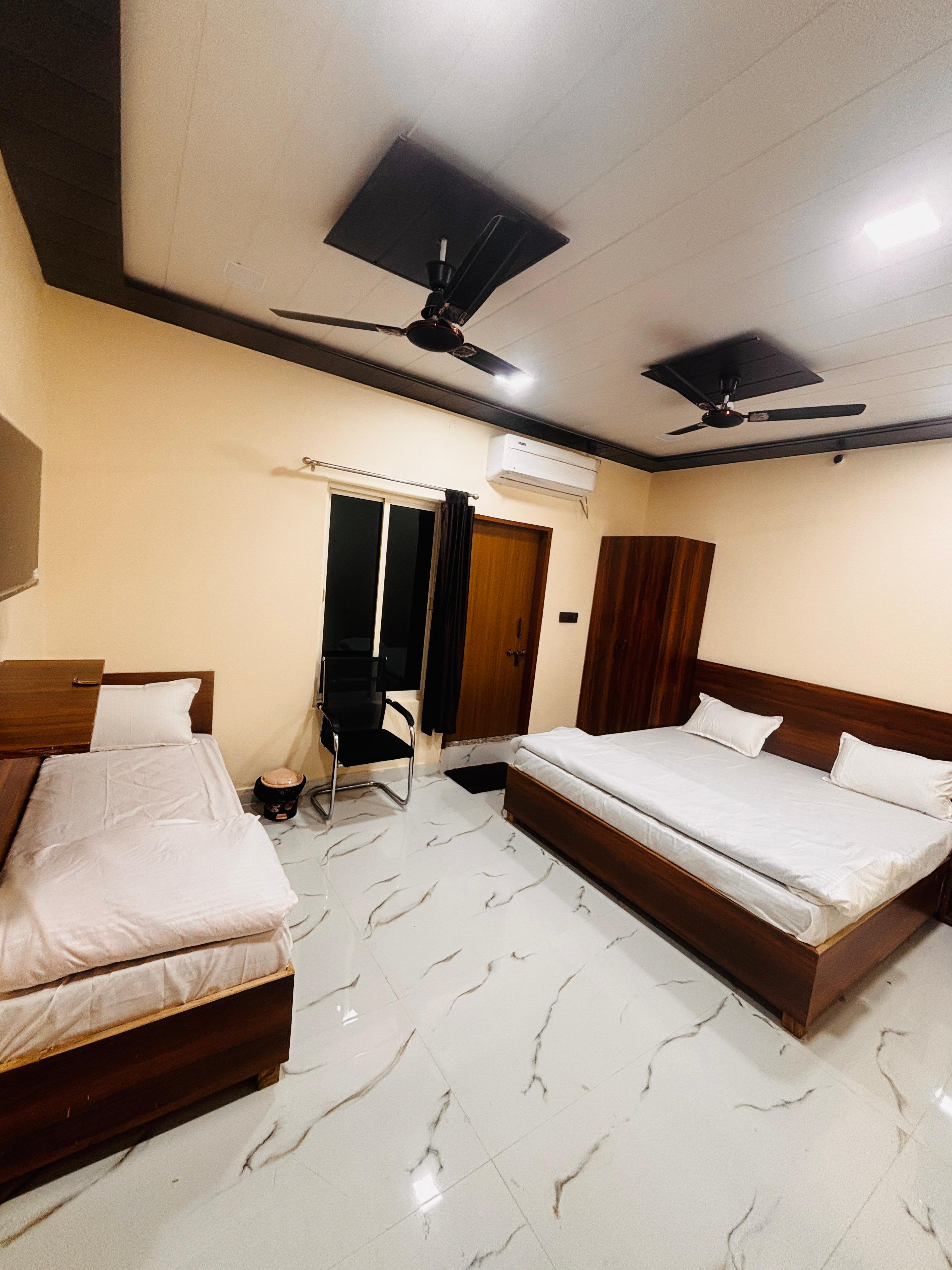 Krishna Residency by Vrindavan Stays - Tap to explore photos
