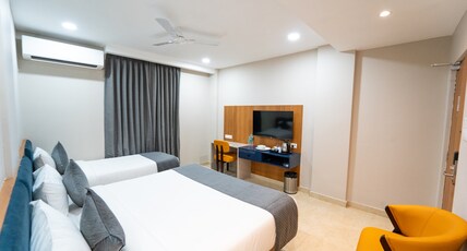 Vasatee Kondapur Room Type - Deluxe Triple with King and Single