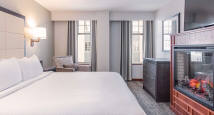 CopperLeaf Boutique Hotel & Spa, BW Premier Collection Room Type - Suite-1 King Bed, Non-Smoking, Living Room, Fireplace, Whirlpool, Sofabed, 2 Flat Screen Tvs