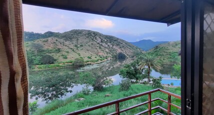 Lake Alpi Resort Kumbhalgarh Room Type - Wooden Cottage with Balcony-Sit out area.