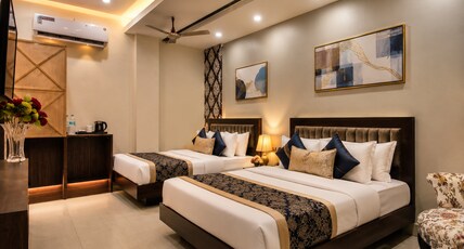 Staybook Hotel Aira @ Paharganj Room Type - Family Room with 2 King size Bed or one Double Bed and one Bunk Bed With Complimentary Wi-Fi Staybook Hotel Aira @ Paharganj Room Type - Family Room with 2 King size Bed or one Double Bed and one Bunk Bed With Complimentary Wi-Fi