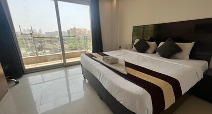 TIPSYY INN 007 Room Type - DELUXE ROOM WITH BALCONY