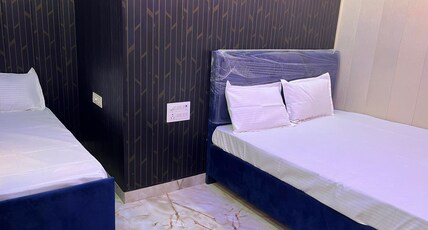 Prabharaj Inn/ Walking Distance To Ram Mandir Room Type - 3 bed Room 
