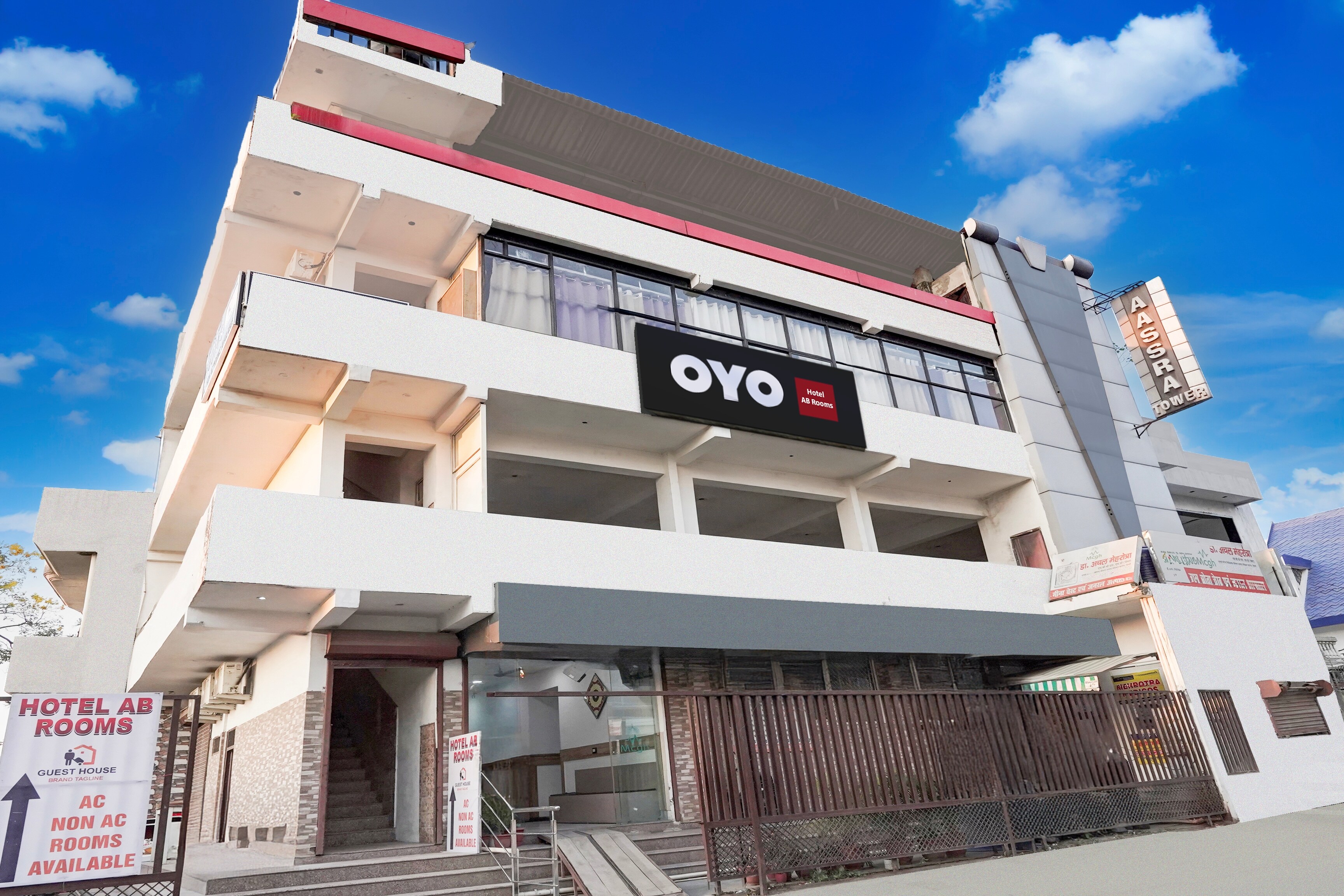 Hotel O AB Rooms - Tap to explore photos