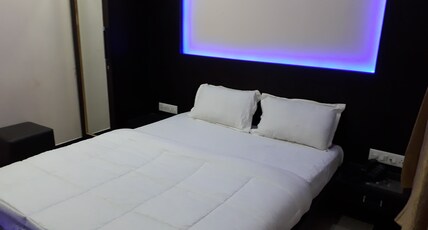 Hotel Raj Residency & Banquets Room Type - Budget Double AC Room