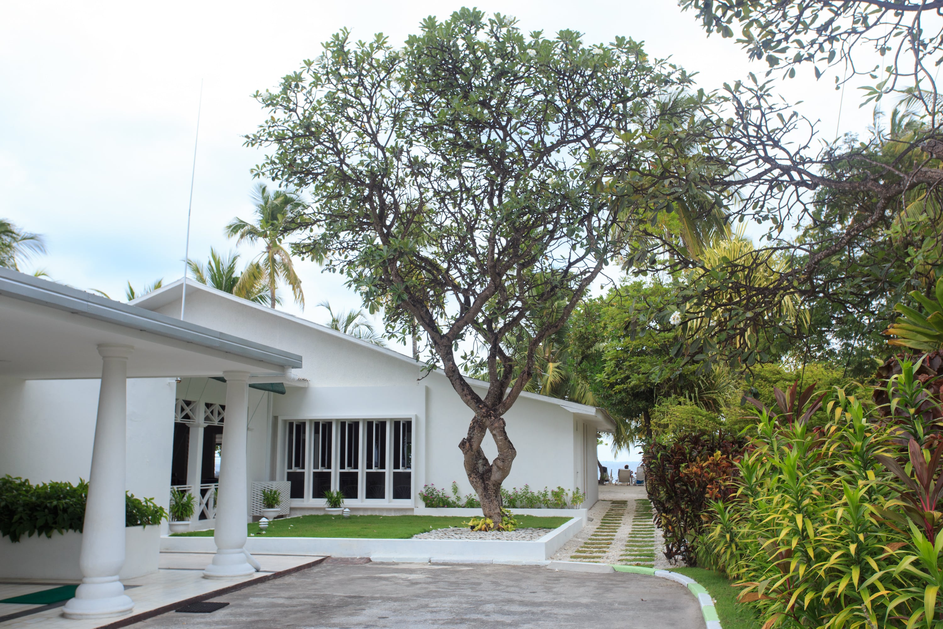 Equator Village Resort - Tap to explore photos