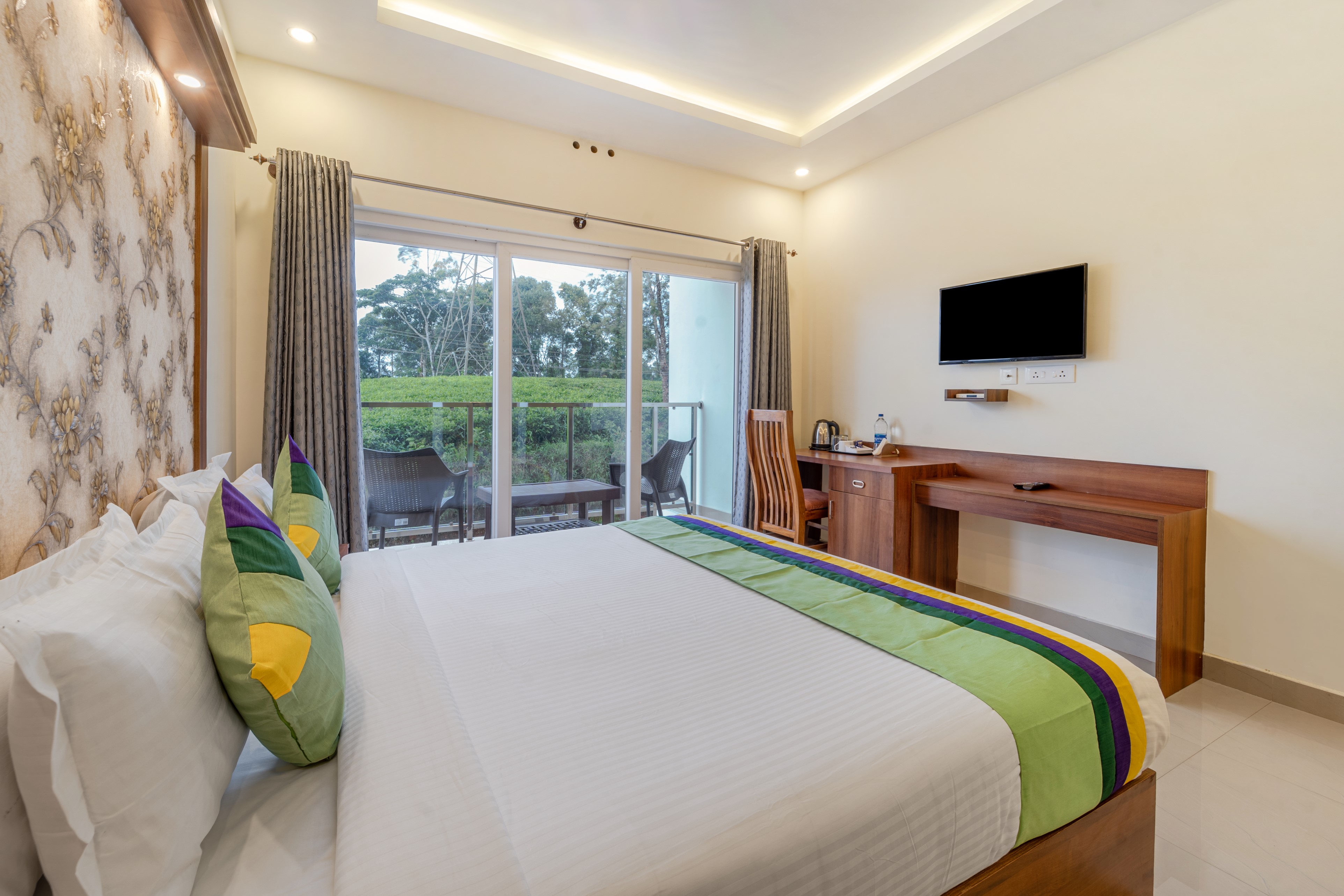 Treebo Windsong Resort Munnar, Tea Plantation View - Tap to explore photos