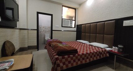 Malik Regency Room Type - DELUXE