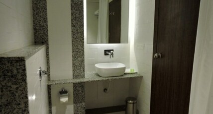Kalyans Hotel Room Type - Deluxe Room