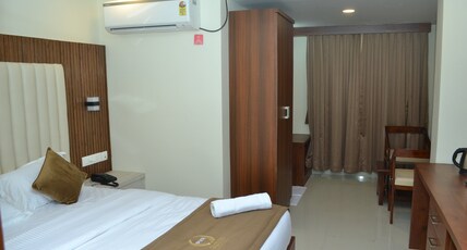 Hotel P V R Grand Inn Room Type - Deluxe Room