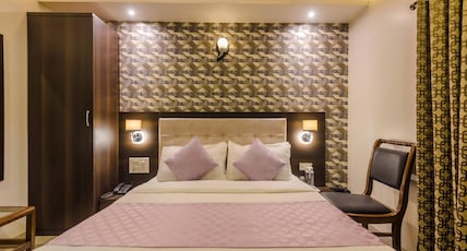 Hotel Liberty Plaza(Close to Phoenix Mall) Room Type - Deluxe Room With Fast WIFI