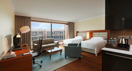Hilton Bangalore Embassy GolfLinks Room Type - Twin Studio Pool Or Golf View Kitchenette with Bathtub Hilton Bangalore Embassy GolfLinks Room Type - Twin Studio Pool Or Golf View Kitchenette with Bathtub