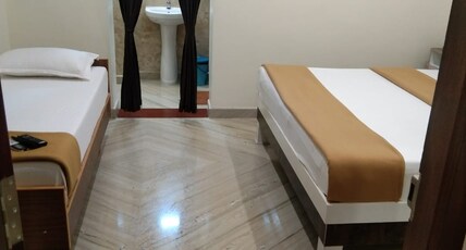 Chellam Inn Room Type - Deluxe Triple Room AC