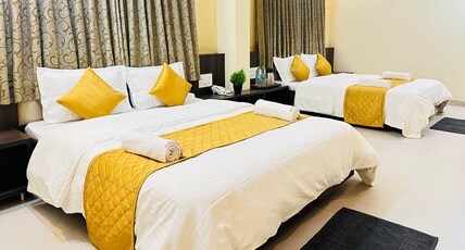 Hotel Sai Gurusthan Room Type - Deluxe Four Bed AC