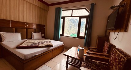 Hotel Brahma Kamal (Near Joshimath Taxi Stand) Room Type - Deluxe Double Bed Hotel Brahma Kamal (Near Joshimath Taxi Stand) Room Type - Deluxe Double Bed