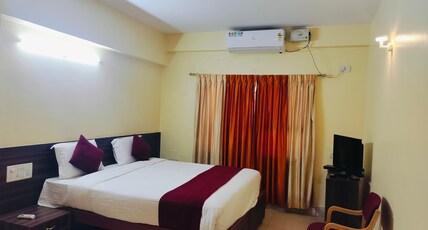 Vyshak International Room Type - Deluxe AC
