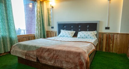 Krishna Kunj Cottage Room Type - Deluxe Room with Private Balcony and Mountain view