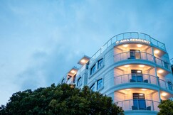 Aina Residency Beachfront Hotel