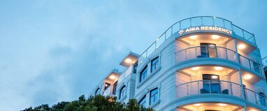 Aina Residency Beachfront Hotel