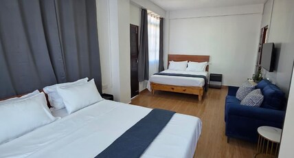 The Olive Inn | Boutique Stay Room Type - Family room with Balcony