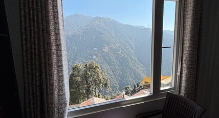 Mathura Agrawal Inn Home Stay Room Type - Deluxe Room with Terrace nd mountain view