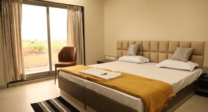 Hotel Rajadhiraj Room Type - 2 bed Non AC Room Hotel Rajadhiraj Room Type - 2 bed Non AC Room